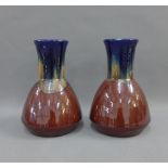 Pair of 1920's art pottery vases, 22cm high