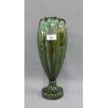 Early 20th century Clement Massier French art pottery vase with loop handles and circular footrim,