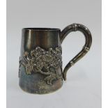 Chinese Export silver tankard by Wang Hing with embossed foliate pattern and faux bamboo, handle,