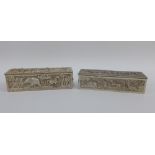 Two white metal rectangular boxes, with hinged lids and embossed Tiger Hunt pattern, 16cm long (2)