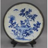 Chinese blue and white plate / charger, with craquelure ground and brown scratch border