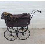 Child's toy pram the metal frame covered in leather with wood mounts, 73 x 54cm