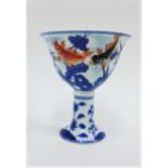 Chinese porcelain stem cup with blue and white flowers and red fish, with six character marks to the