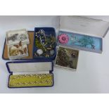 Collection of vintage costume jewellery to include a Corocraft brooch, beads, watch chains etc (a