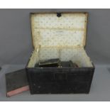 French Maison Censier trunk, 58 x 35cm, containing a selection of vintage tins and a Bible, (a lot)