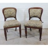 Pair of 19th century mahogany framed chairs with low upholstered backs, seats and fluted legs, 83