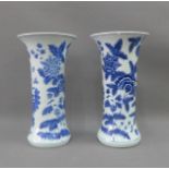 Two Chinese style blue and white vases with flared rims and floral pattern, (a/f) , 32cm