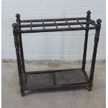 19th century black painted wooden stick stand with twelve apertures, 60 x 65 x 26cm