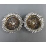 Pair of 18th century Epns wine coasters with turned wooden bases, 19cm diameter, (2)