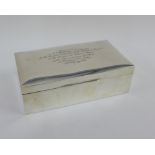 George V silver box, the hinged lid with an presentation inscription, Chester 1911, 17 x 10cm