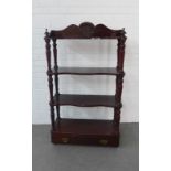 Mahogany three tier whatnot with a single long drawer to the base, 77 x 135 x 32cm