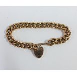 9ct gold hollow curb link bracelet with a 9ct gold heart padlock, approx 12.5g