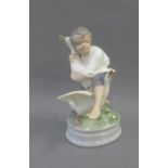 Royal Copenhagen figure of a boy with geese, printed backstamp and model number 2139, 17cm high