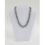 Tahitian south sea pearl necklace, with thirty seven round black lustre pearls, with an 18ct white