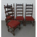 Set of four dark oak high back chairs, with pierced horizontal splats, upholstered seats an turned