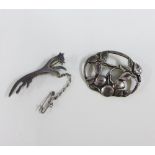 Bernhard Instone Sterling silver brooch and a Sheffield silver celtic horse brooch, largest 5.5cm