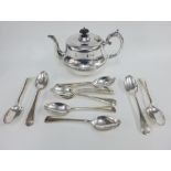 A set of eleven Epns dessert spoons and an Epns teapot (12)