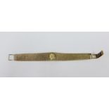 Lady's vintage 9ct gold Rotary seventeen jewels wristwatch, on a textured bracelet strap, stamped