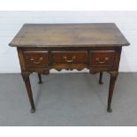Oak lowboy, rectangular top, three frieze drawers and scrolling apron, on cabriole legs, 93 x 74 x
