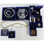 A large collection of boxed Swarovski jewellery to include a snake necklace, etc (a lot)