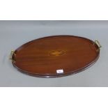 Mahogany tray with inlaid urn motif, brass handles, 63cm long