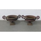 Pair of cast metal garden urn planters, of campana form with scrolling handles and square bases,