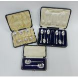 Cased set of silver teaspoons with sugar tongs, Sheffield 1922, another cased set of six silver