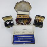 A jewellery box, costume jewellery, various cufflinks, shirt studs and a Parker pen set and an