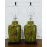 A pair of large green glazed table lamp bases with bird and flower pattern in red, blue and