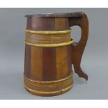 Wooden tankard with hinged lid, 18cm high