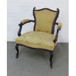 19th century ebonised open armchair with upholstered back, arms and seat, on carved cabriole legs