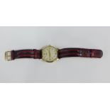 Gents Longines 9ct gold, manual wind wrist watch, with cream dial and Arabic and hour baton markers,
