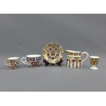 Collection of Royal Crown Derby Imari china to include a cream jug, two cups , saucer and eg cup,
