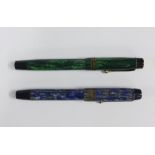 Golden Guinea blue marbled fountain pen with a 14ct gold nib and a Golden Sovereign green marbled fo