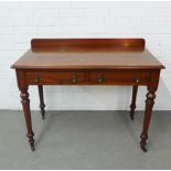 19th century mahogany ledgeback table with two frieze drawers, turned tapering legs and brass caps