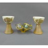 Margery Clinton lustre glazed pottery to include a pair of fish patterned goblet vases and a bowl,