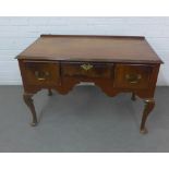 Mahogany lowboy with three drawers and a shaped apron, 114 x 76 x 62cm