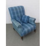 Blue tartan upholstered wing armchair on mahogany legs, 68 x 92cm