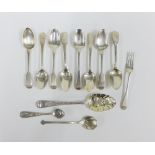 A collection of hallmarked silver items to include a berry spoon, eight various teaspoons, 'Iona'