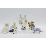Collection of pottery and porcelain dogs to include Staffordshire, Delft and Spongeware examples,
