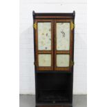 Aesthetic ebonised and burrwood music cabinet, with pair of glazed doors with embroidered panels and