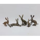 Collection of five bronze patinated resin figures of Hares, tallest 19cm (5)