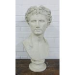 White painted plaster bust of Roman style Emperor, wearing a laurel leaf wreath, on a socle base,