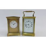 Two brass and glass panelled carriage clocks to include Whytock & Sons Dundee, (2)