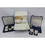 A quantity of Westminster white metal coins, royal Mint white metal coins and other commemorative