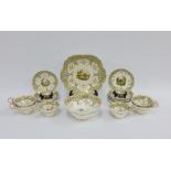 An English porcelain teaset, Rockingham style pattern 688, comprising cake plate, slop bowl, six