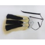 Scottish horsehair sporran with silver plated cantle and black leather pouch