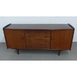 1960's Volnay sideboard by John Herbert, with four graduated long drawers flanked by cupboards, with
