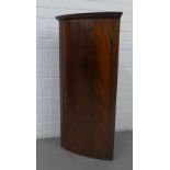 19th century mahogany corner cabinet, with a curved door and shelved interior, with key, 47 x 97