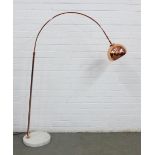 Floor lamp with overarching copper arm and shade, on a white veined hardstone base, 136 cm